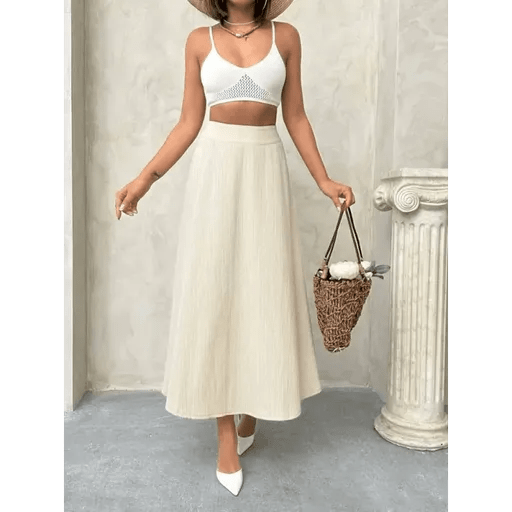 Uzun Astarli Etek Modeli ile Şıklığı Yakalayın - ÖZER&HERMİN